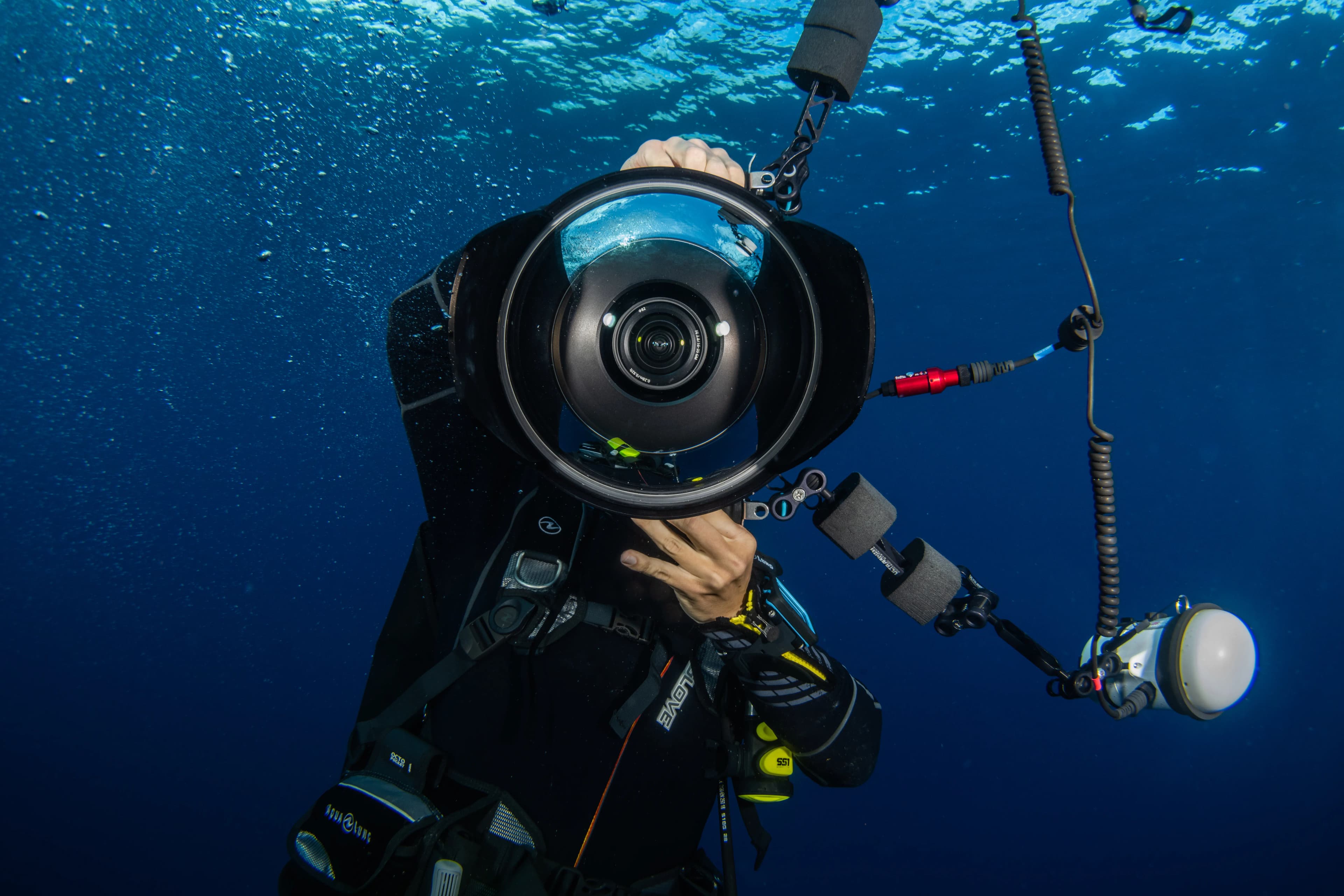Professional scuba diver taking a picture