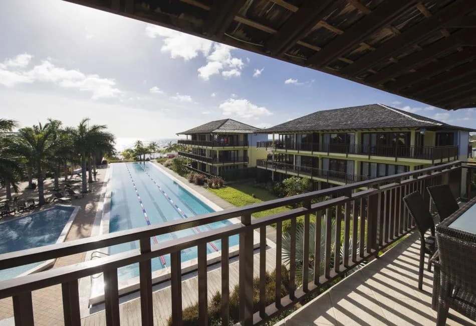 Pool view from a balcony at Lions Dive & Beach Resort Curaçao.