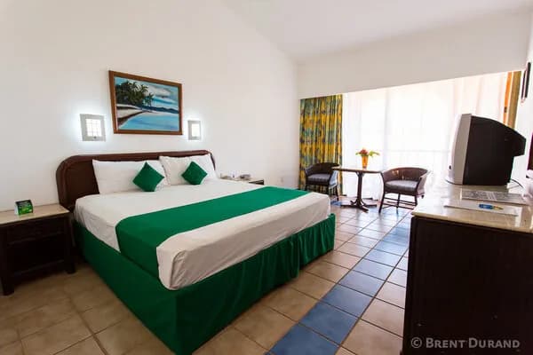 A bed in a hotel room.